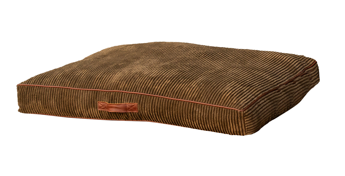 Dog bed - green corduroy with leather piping